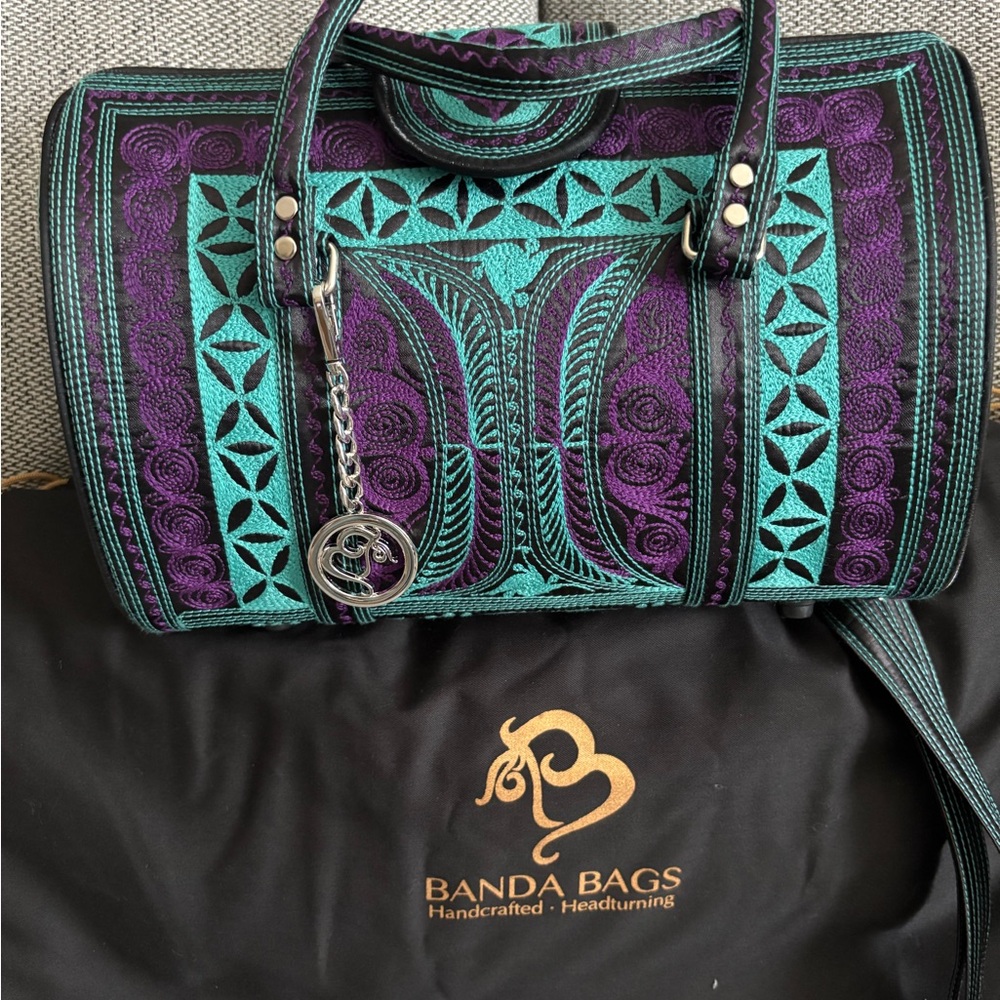 Banda Barrel Bags Purple and Teal Bag gently used, also a silver one never used.
